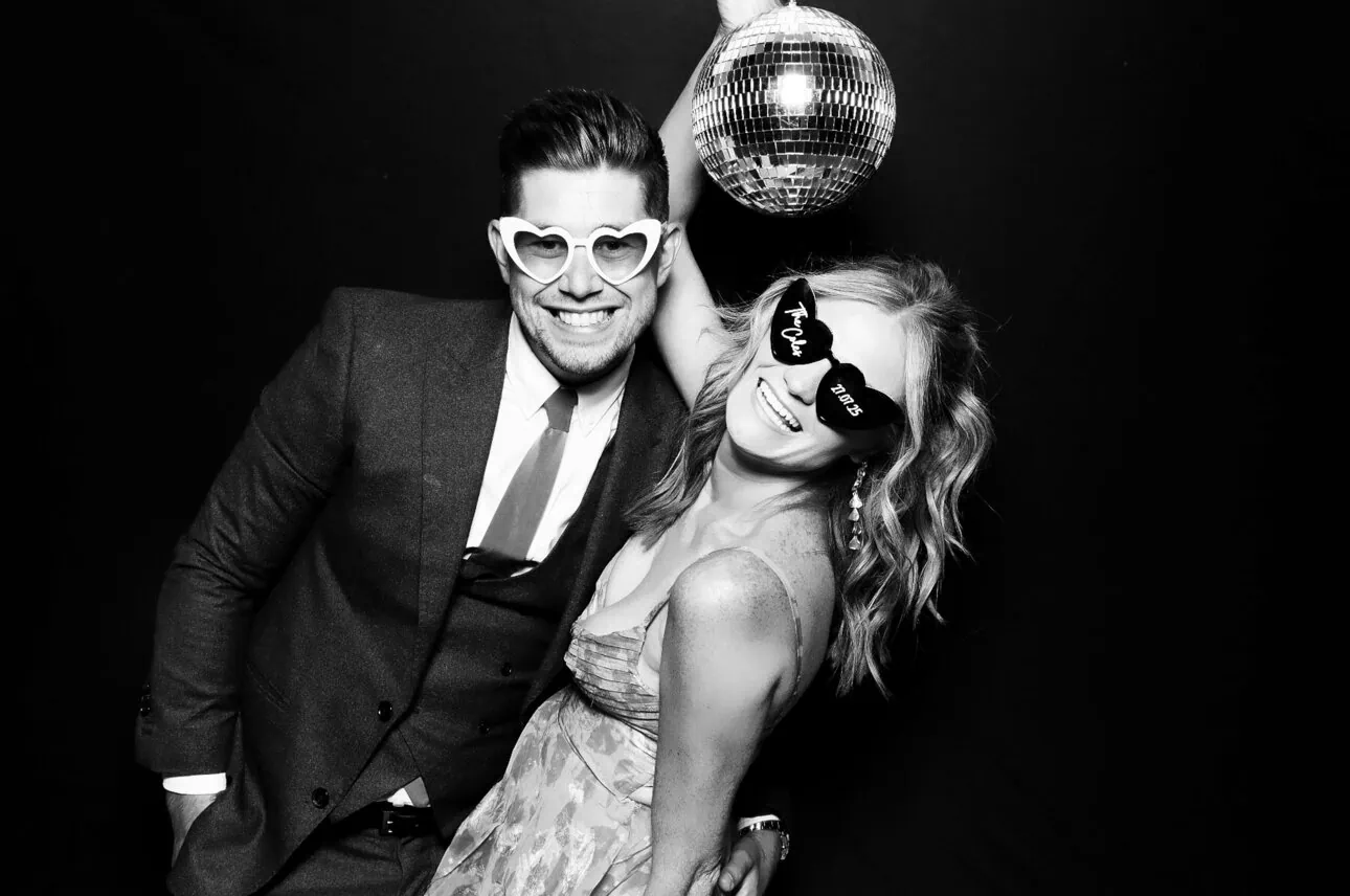 Guests enjoying a stylish MooMuu photo booth portrait.