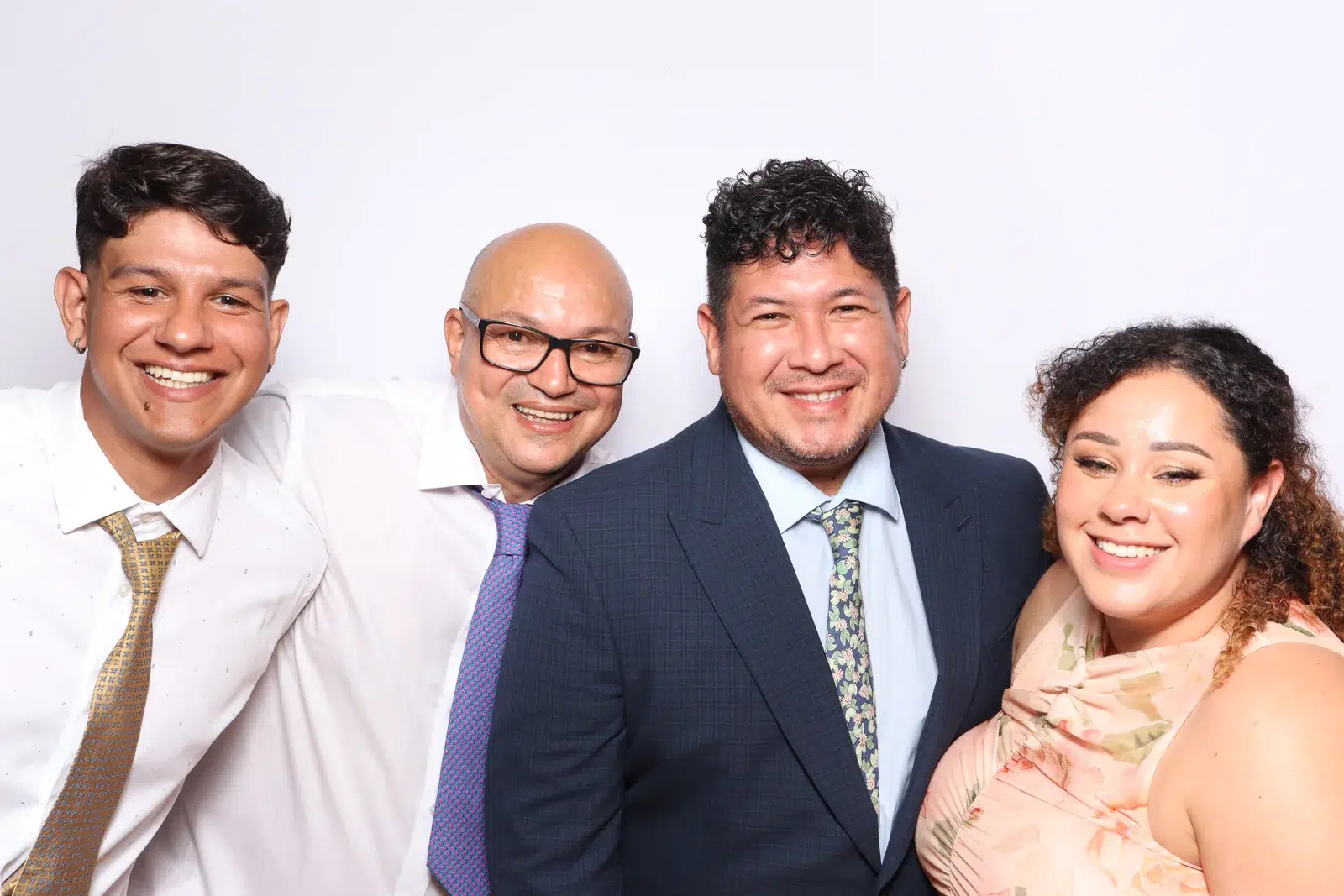 Four guests captured in a refined group portrait